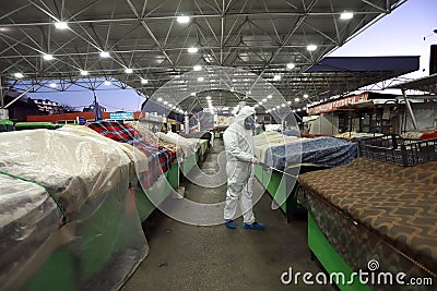 Disinfection and decontamination on a marketplace â€œKrasno seloâ€ as a prevention against Coronavirus disease 2019 COVID-19 Editorial Stock Photo